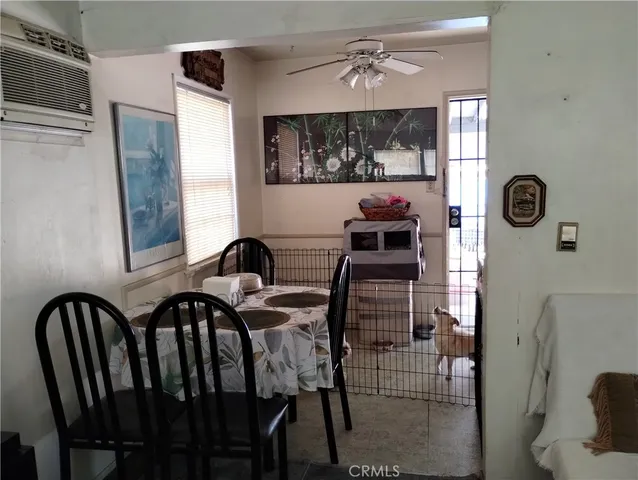 a kitchen with a sink and a stove top oven