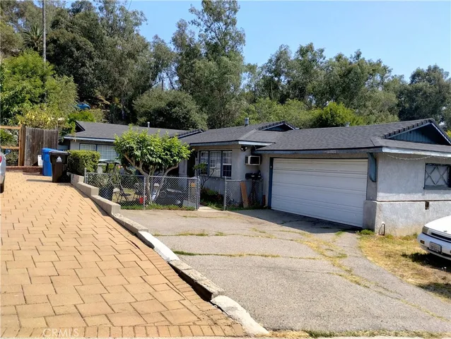 a view of a house with a patio