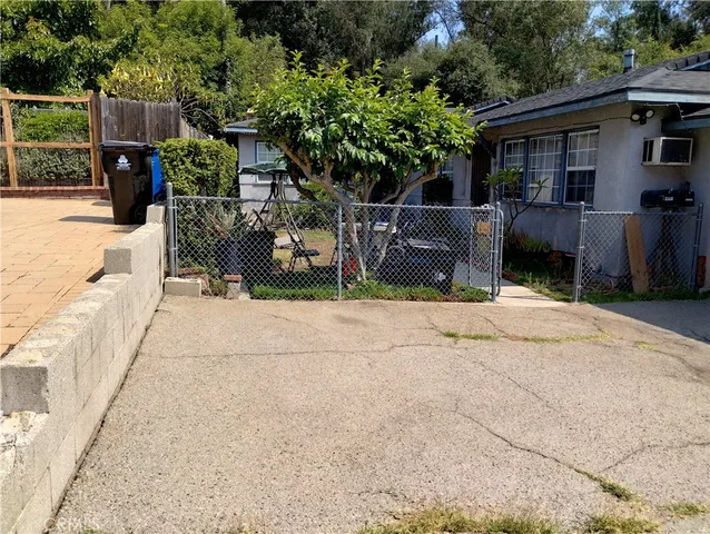 a view of house with a outdoor space
