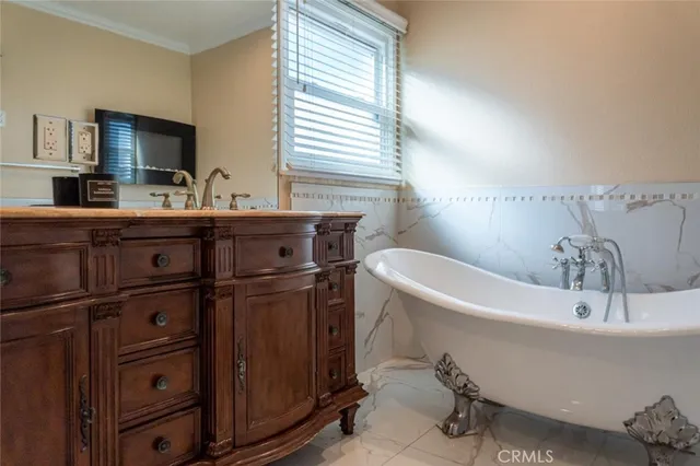 a bathroom with a sink and a bathtub