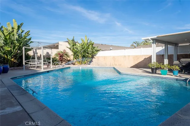 swimming pool view with a outdoor space