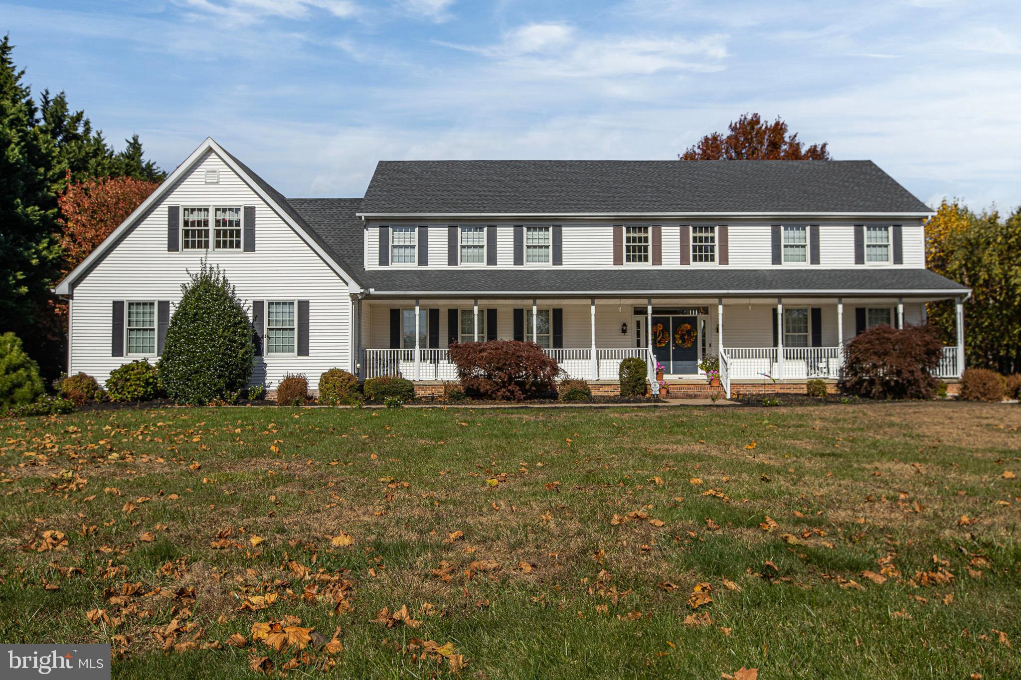 657 Vance Neck Road Middletown, DE 19709 - Photo 54 of 73 a front view of a house with a garden