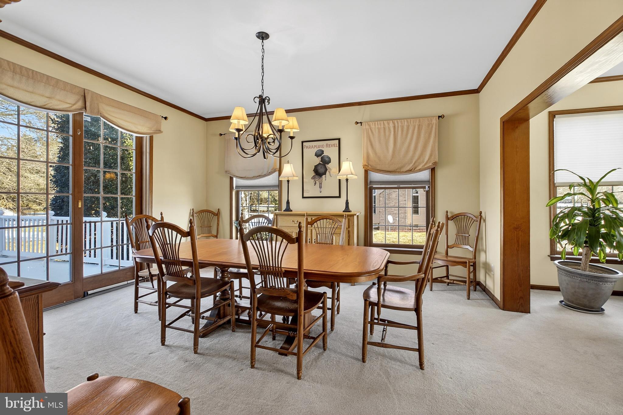657 Vance Neck Road Middletown, DE 19709 - Photo 10 of 73 a view of a dining room with furniture window and wooden floor