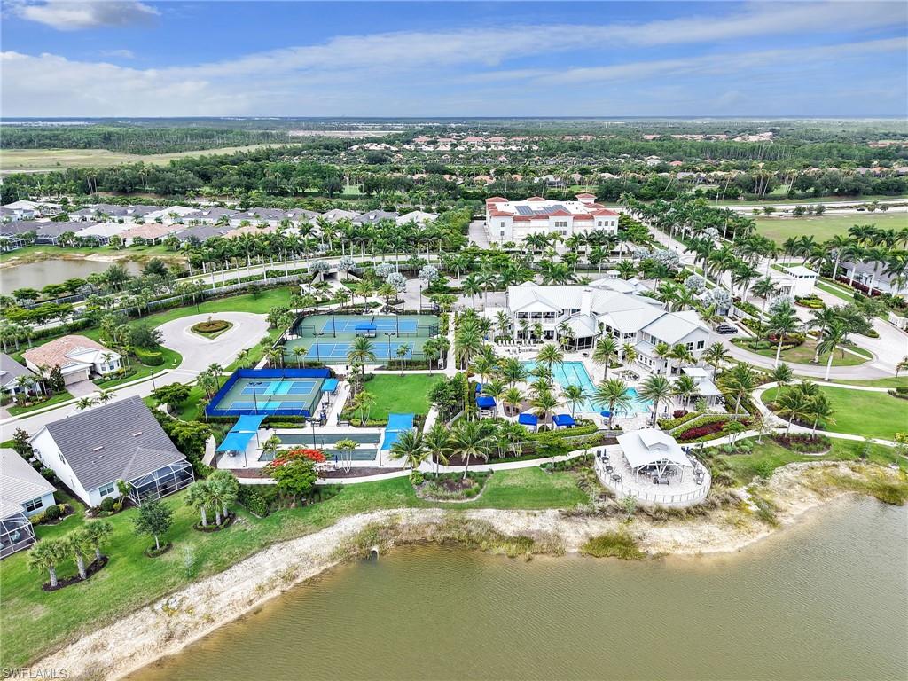 20064 Wymberly Way Estero, FL 33928 - Photo 44 of 47 a view of a city with lots of residential buildings ocean and mountain view in back