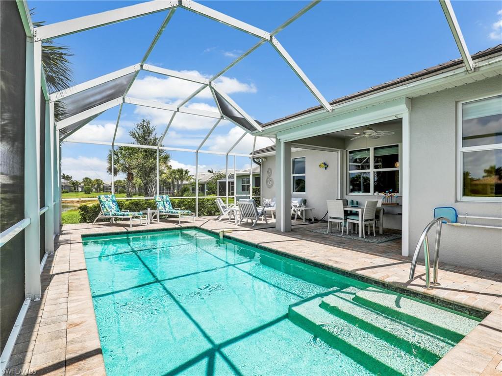 20064 Wymberly Way Estero, FL 33928 - Photo 7 of 47 a view of swimming pool with seating area