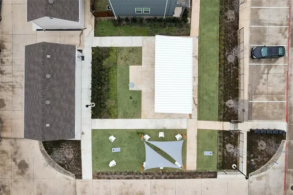 a kitchen with stainless steel appliances a microwave a sink and refrigerator