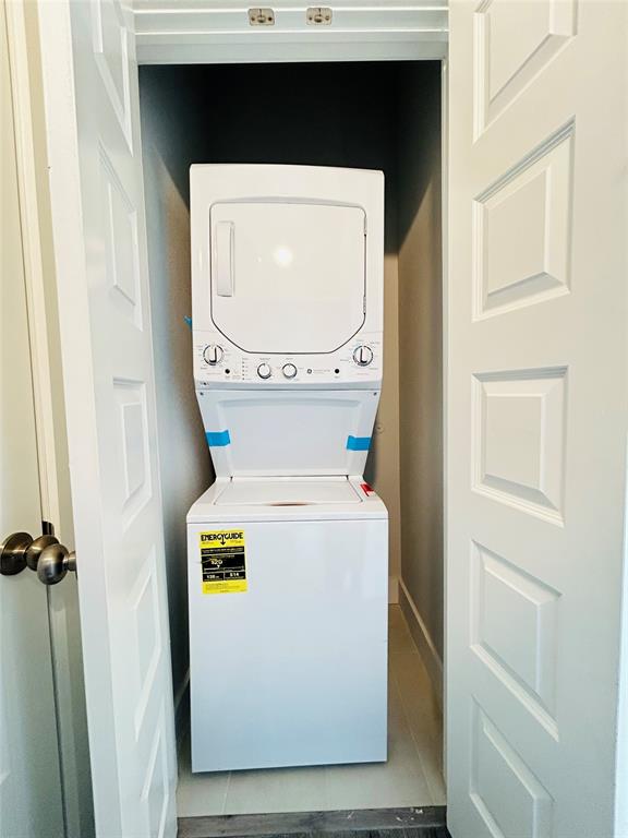760 West Bedford Euless Road, Unit 200 Hurst, TX 76053 - Photo 17 of 39 a utility room with dryer and washer