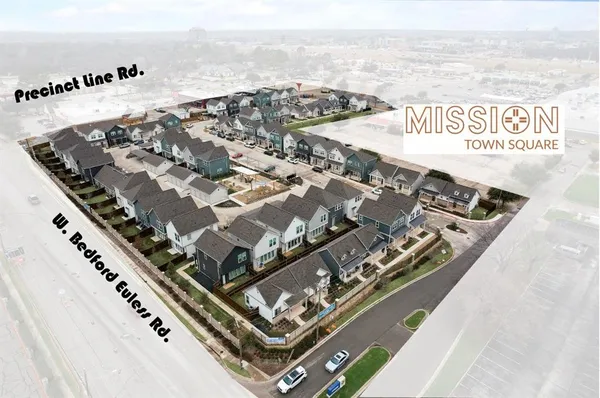 a view of backyard with wooden fence and large trees