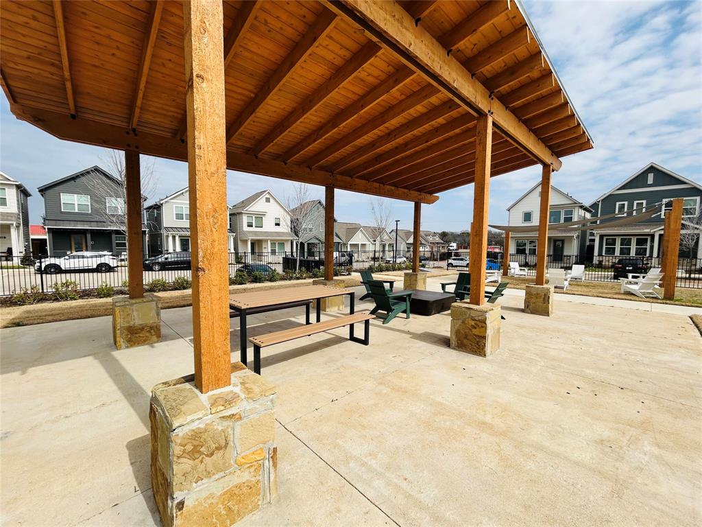 760 West Bedford Euless Road, Unit 200 Hurst, TX 76053 - Photo 9 of 39 a outdoor space with lots of palm trees