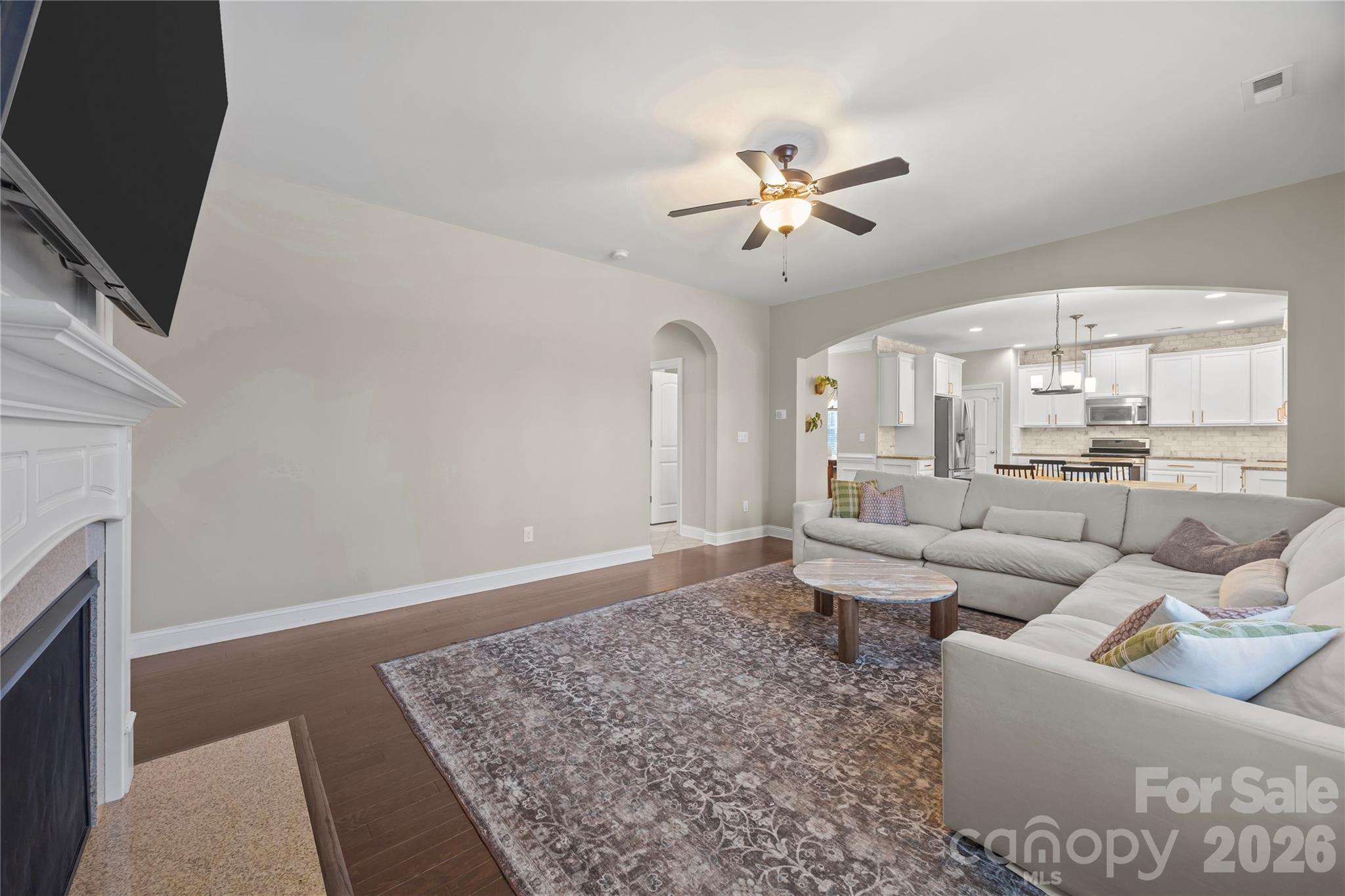 921 Rock Forest Way Fort Mill, SC 29707 - Photo 17 of 40 a living room with furniture and a flat screen tv