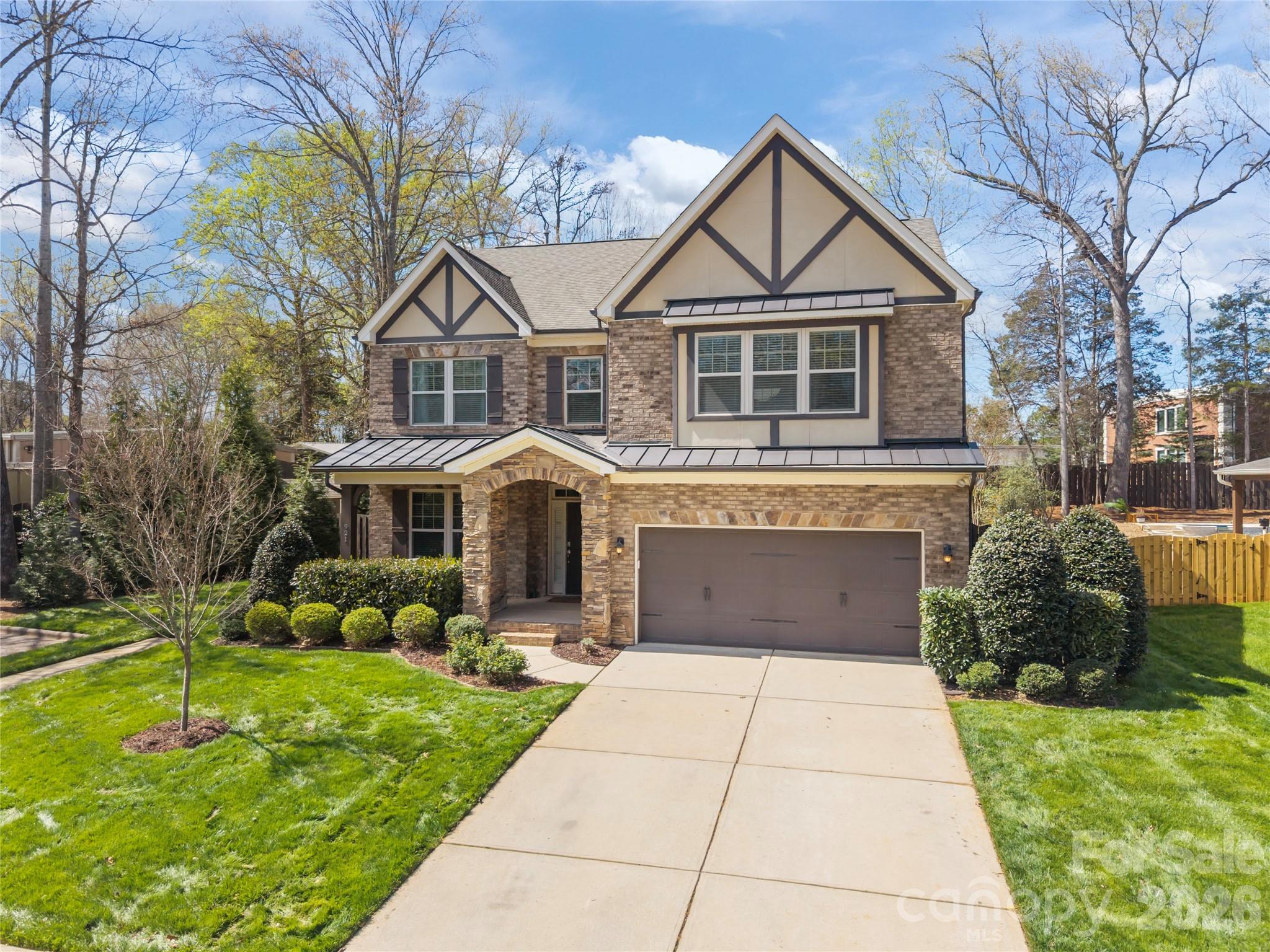 921 Rock Forest Way Fort Mill, SC 29707 - Photo 2 of 40 a front view of a house with garden