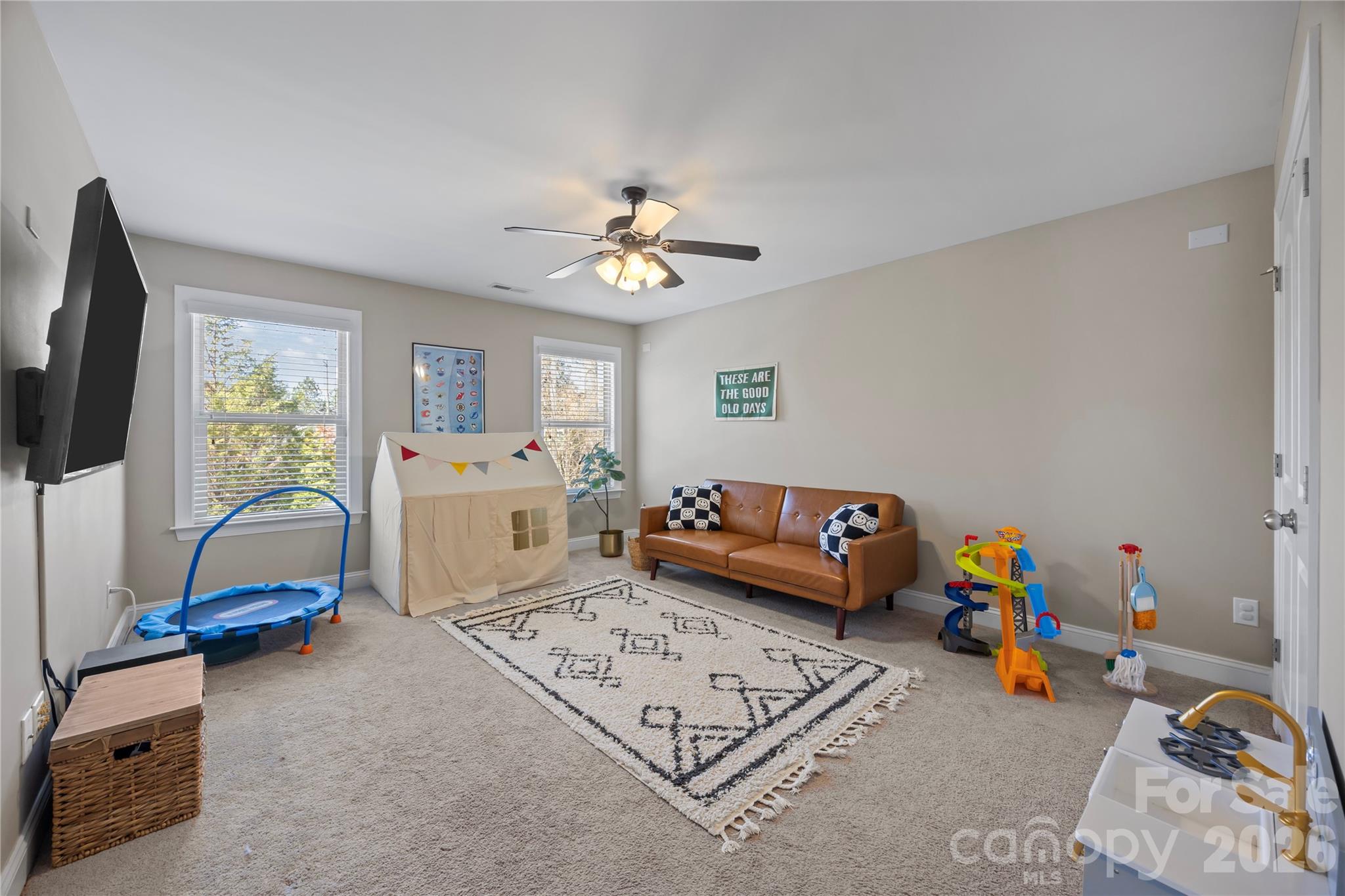 921 Rock Forest Way Fort Mill, SC 29707 - Photo 33 of 40 a living room with furniture and a flat screen tv