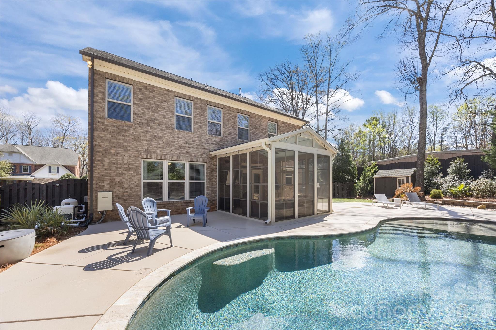 921 Rock Forest Way Fort Mill, SC 29707 - Photo 37 of 40 a house view with swimming pool and sitting space