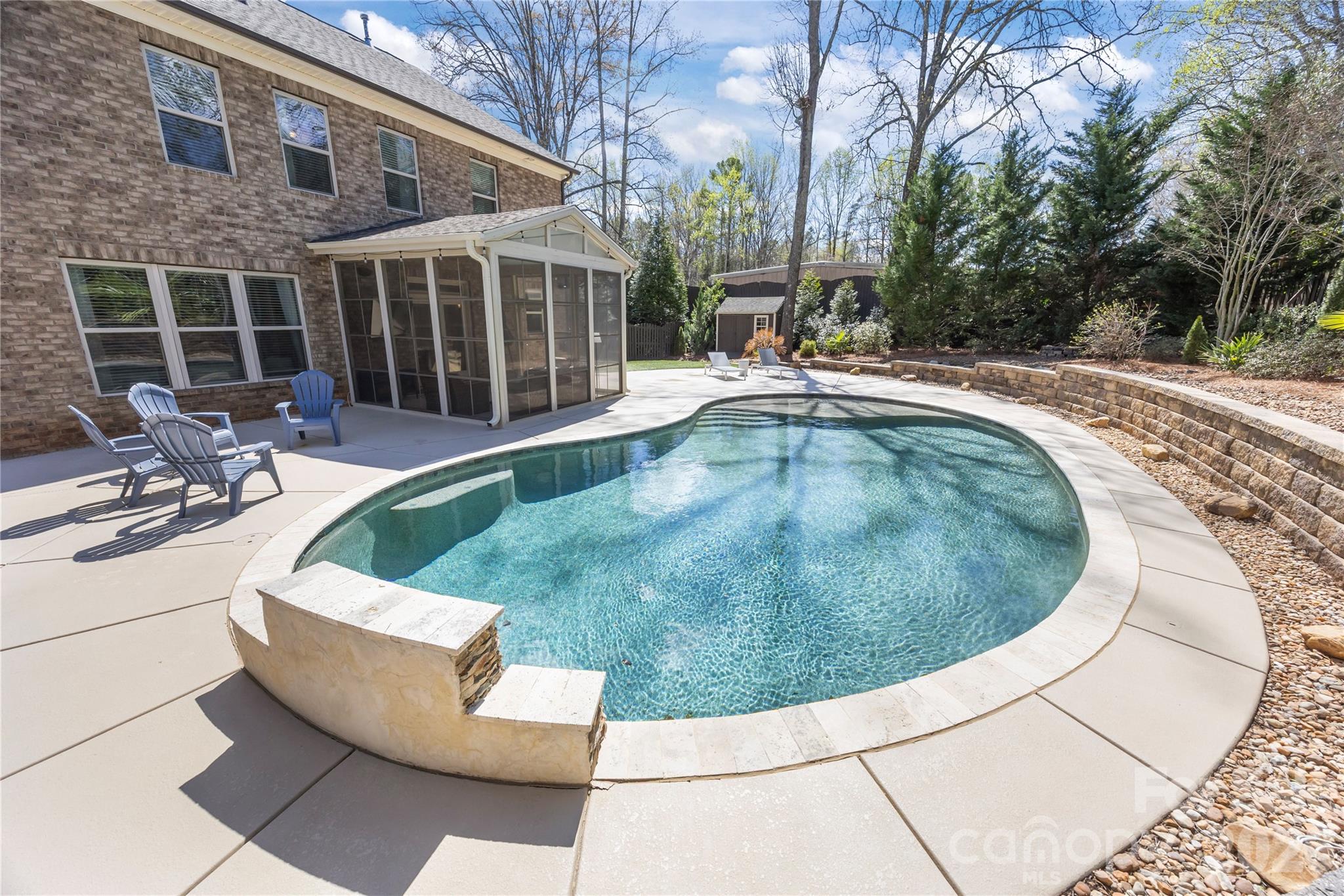 921 Rock Forest Way Fort Mill, SC 29707 - Photo 5 of 40 a view of outdoor space yard deck patio and swimming pool
