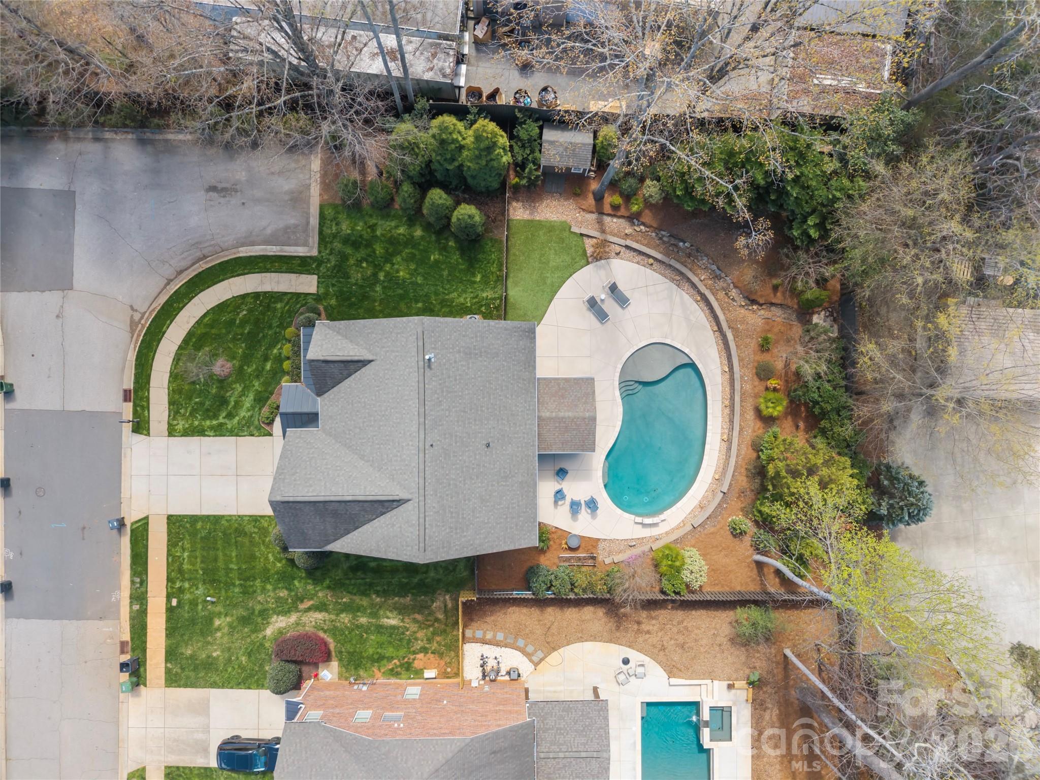 921 Rock Forest Way Fort Mill, SC 29707 - Photo 6 of 40 an aerial view of a house with outdoor space pool seating area and entertaining space