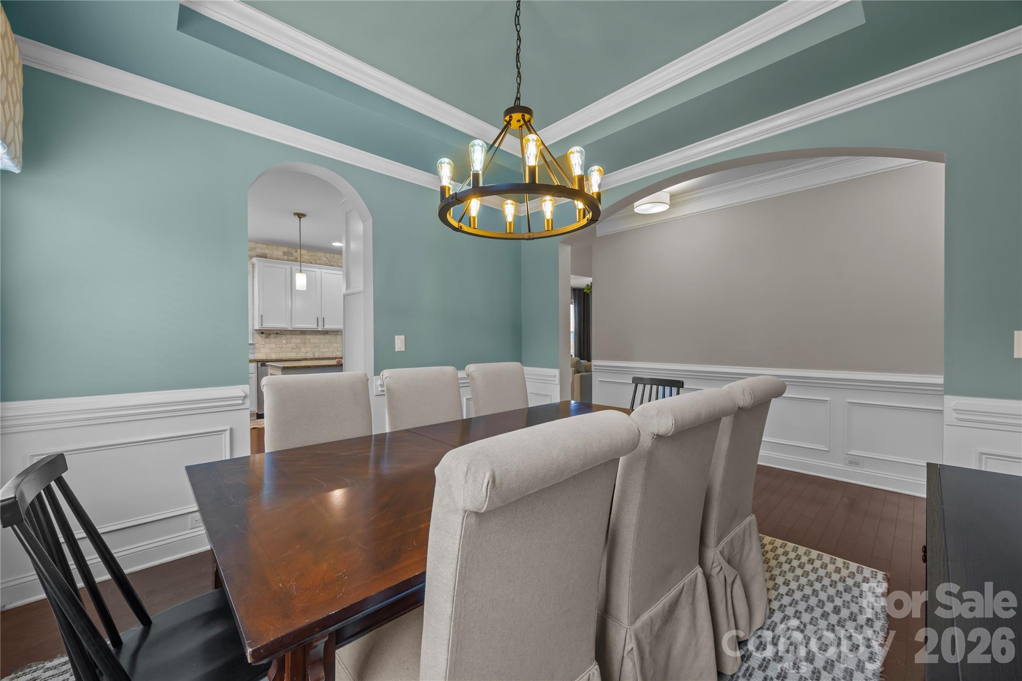 921 Rock Forest Way Fort Mill, SC 29707 - Photo 9 of 40 a view of a dining room with furniture and chandelier