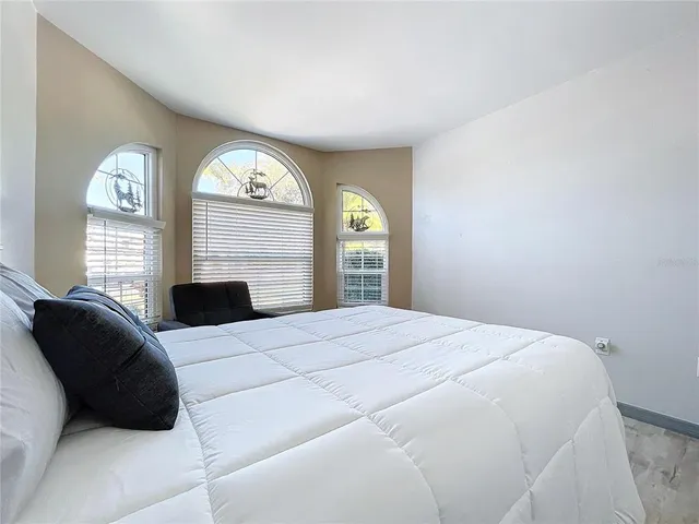 a close view of a utility room with dryer and washer