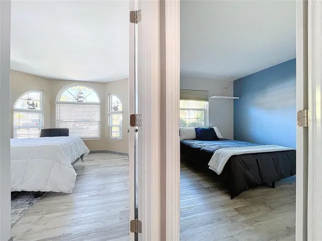 a view of a house with a yard and a garage