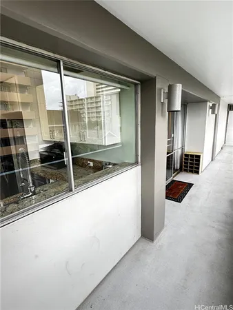 a view of a sink and a large window