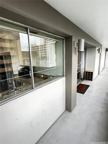 a view of a sink and a large window