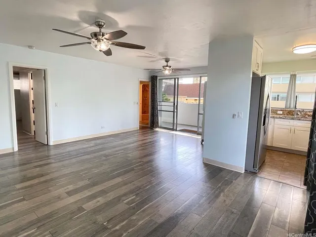 a view of a livingroom with wooden floor