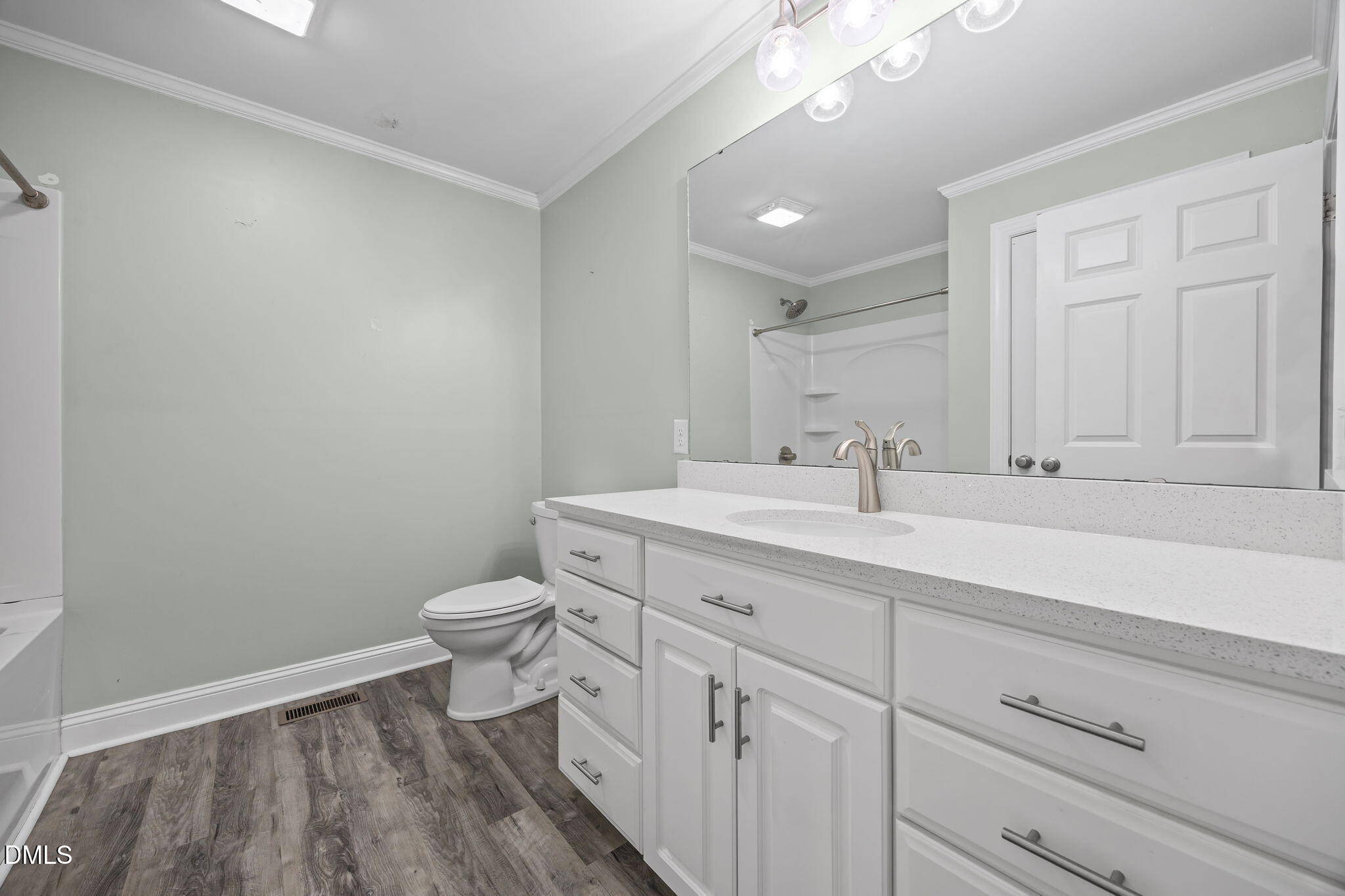 3611 Chewning Road Oxford, NC 27565 - Photo 43 of 45 a bathroom with a toilet a sink and mirror