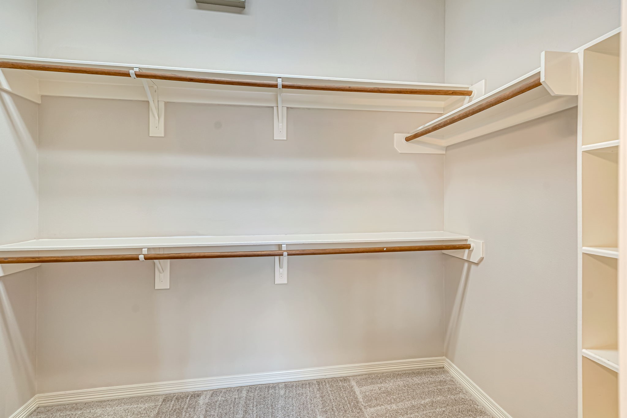 24919 Corbin Gate Drive Spring, TX 77389 - Photo 14 of 31 a view of a room with racks on the wall