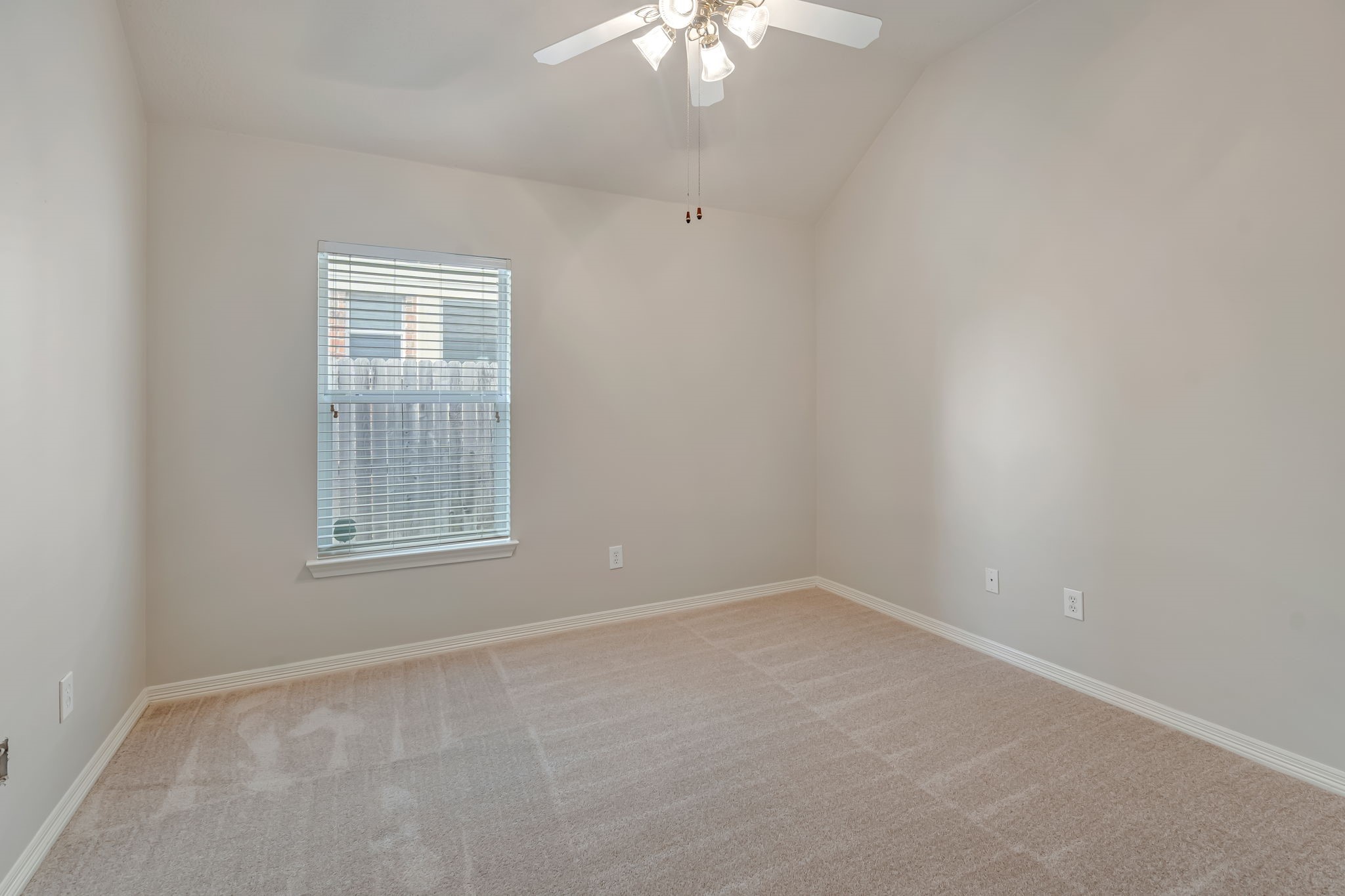 24919 Corbin Gate Drive Spring, TX 77389 - Photo 17 of 31 an empty room with a window