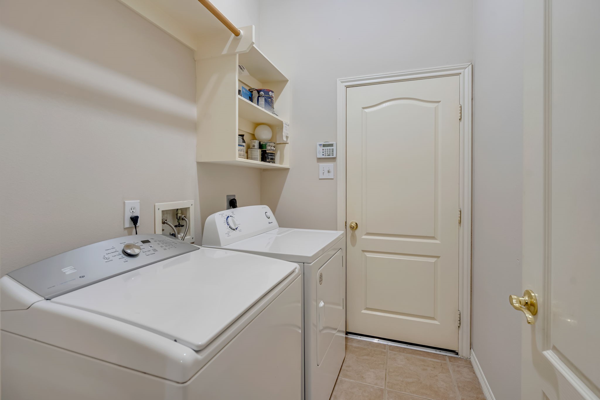 24919 Corbin Gate Drive Spring, TX 77389 - Photo 23 of 31 a utility room with dryer and washer