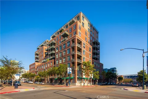 a outdoor dining space with furniture and a potted plant