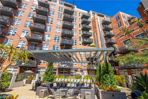 a view of a chairs and table in the patio