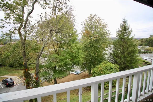 a view of a balcony with an outdoor space