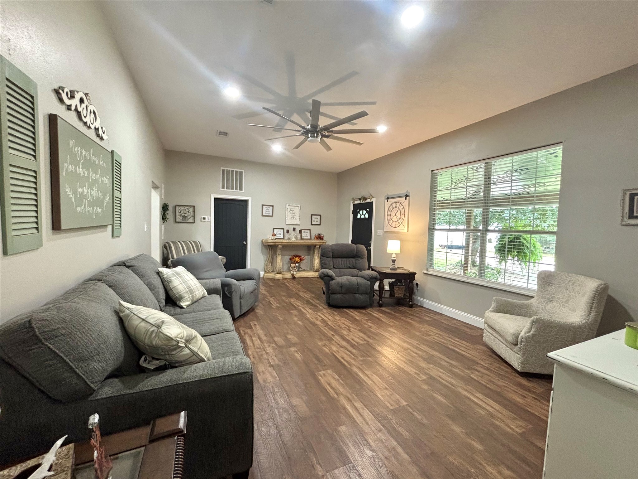516 County Road 4800 Warren, TX 77664 - Photo 11 of 50 a living room with furniture and a large window