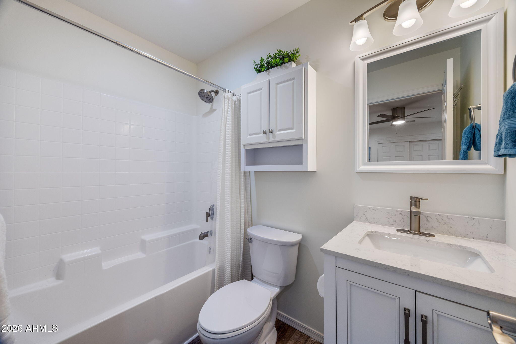 5145 Drifting Snow Loop Pinetop, AZ 85935 - Photo 14 of 37 a bathroom with a sink a toilet and shower