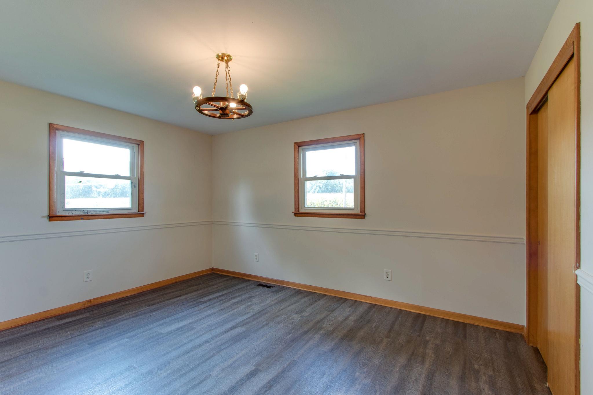 403 Park Creek Road Manchester, TN 37355 - Photo 11 of 24 a view of a room with wooden floor fan and window