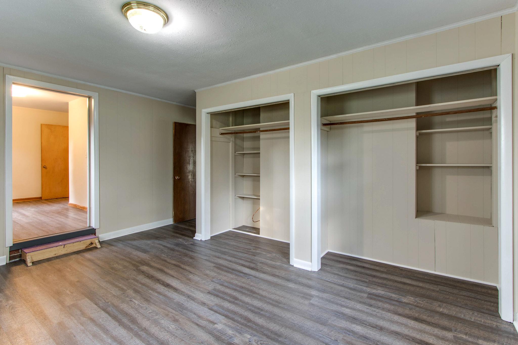 403 Park Creek Road Manchester, TN 37355 - Photo 16 of 24 an empty room with wooden floor closet and windows