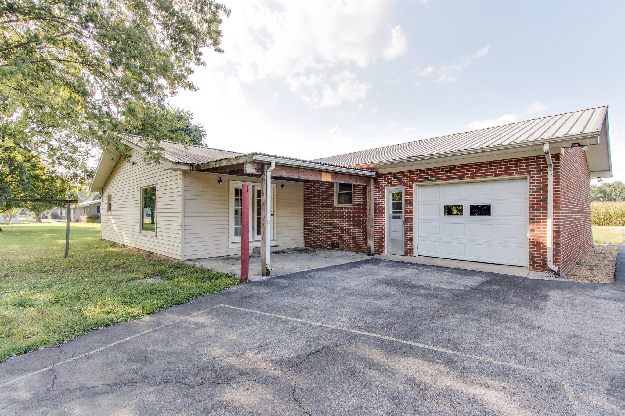 403 Park Creek Road Manchester, TN 37355 - Photo 21 of 24 a view of a house with a backyard