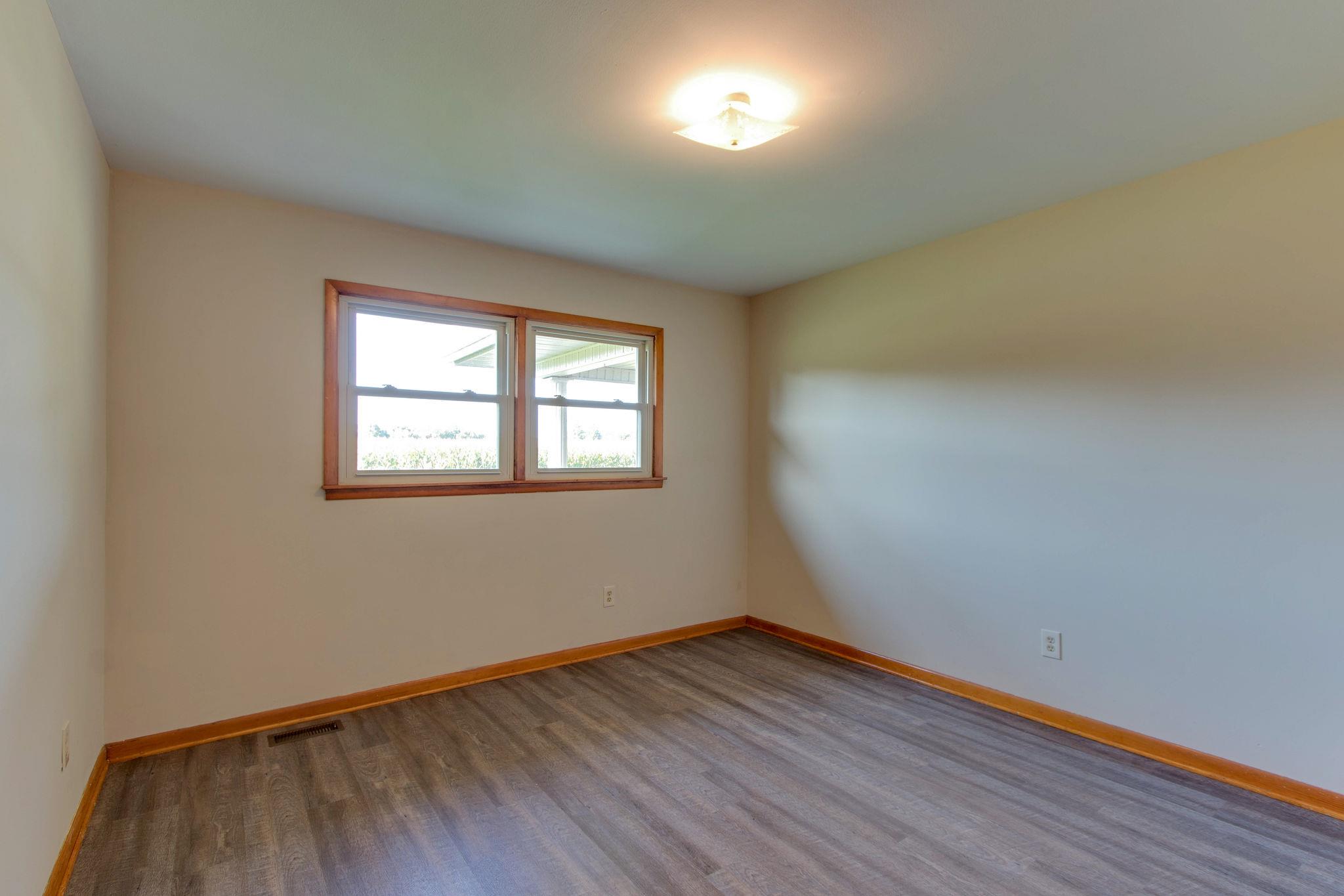 403 Park Creek Road Manchester, TN 37355 - Photo 8 of 24 a view of a room with wooden floor and windows