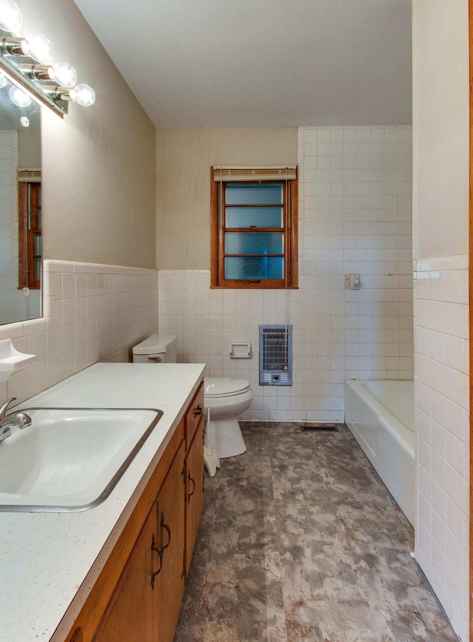 403 Park Creek Road Manchester, TN 37355 - Photo 10 of 24 a bathroom with a sink a toilet and shower