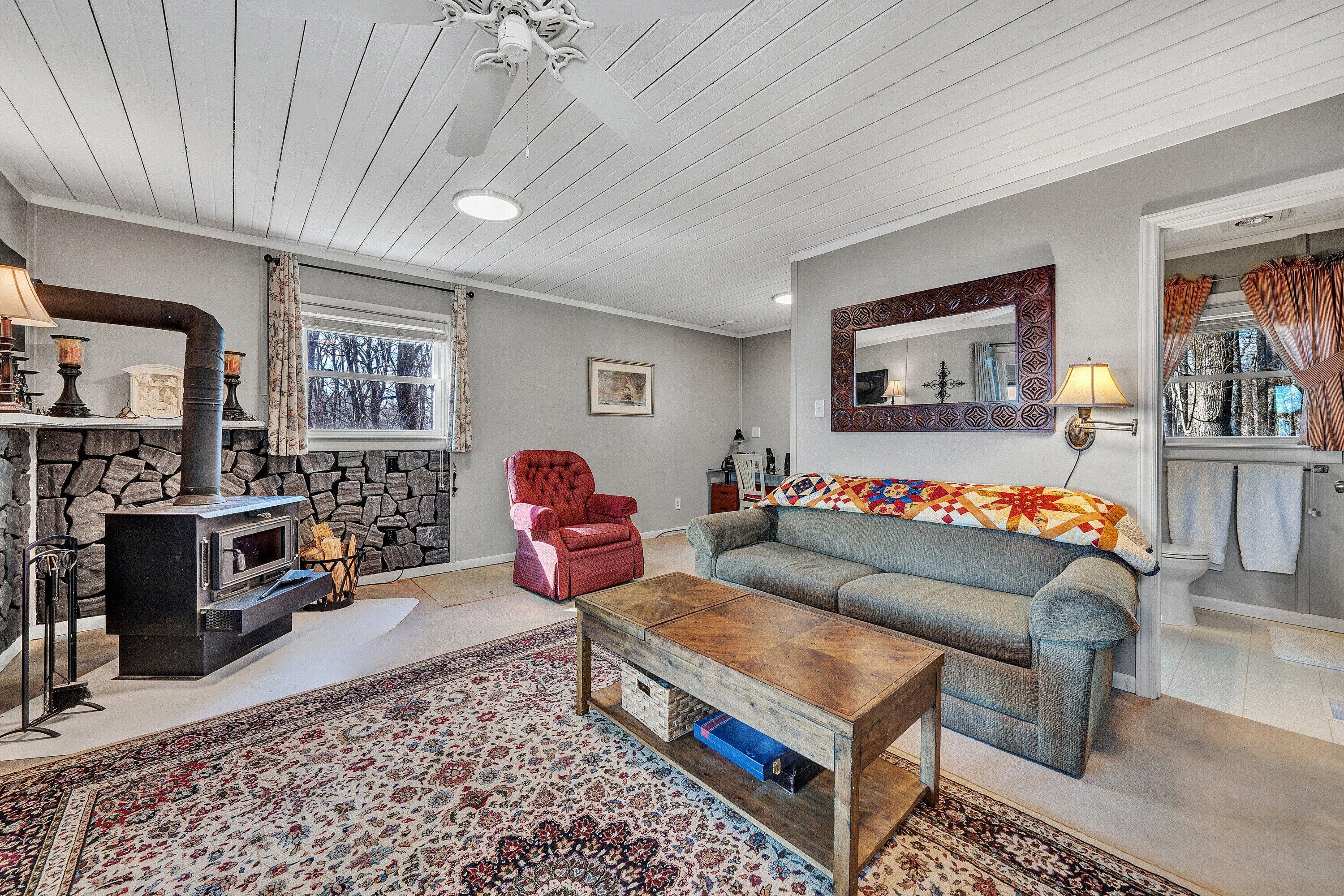 1575 Walnut Knob Road Floyd, VA 24091 - Photo 30 of 62 a living room with furniture and a rug