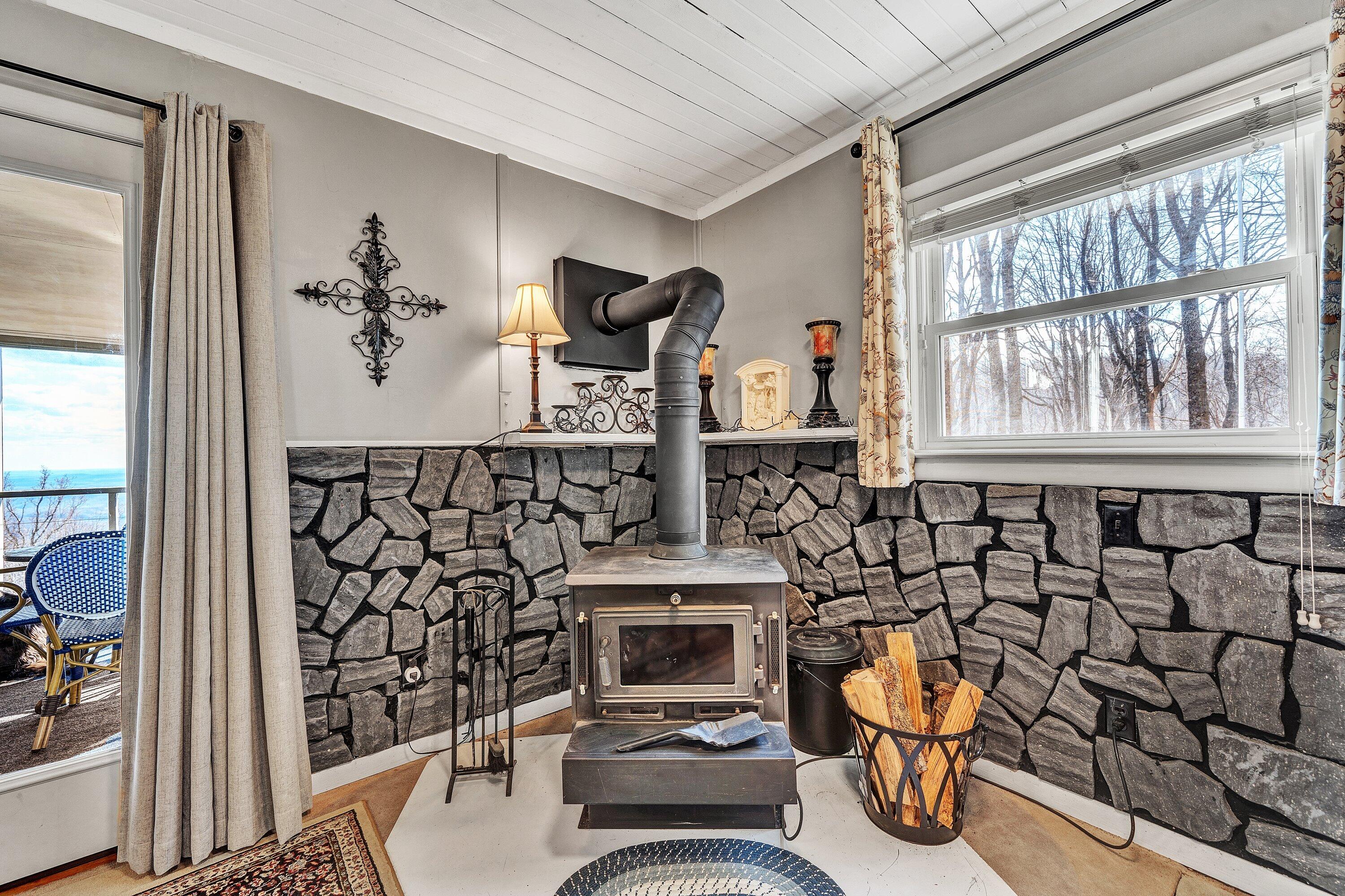 1575 Walnut Knob Road Floyd, VA 24091 - Photo 31 of 62 a living room with furniture and a fireplace