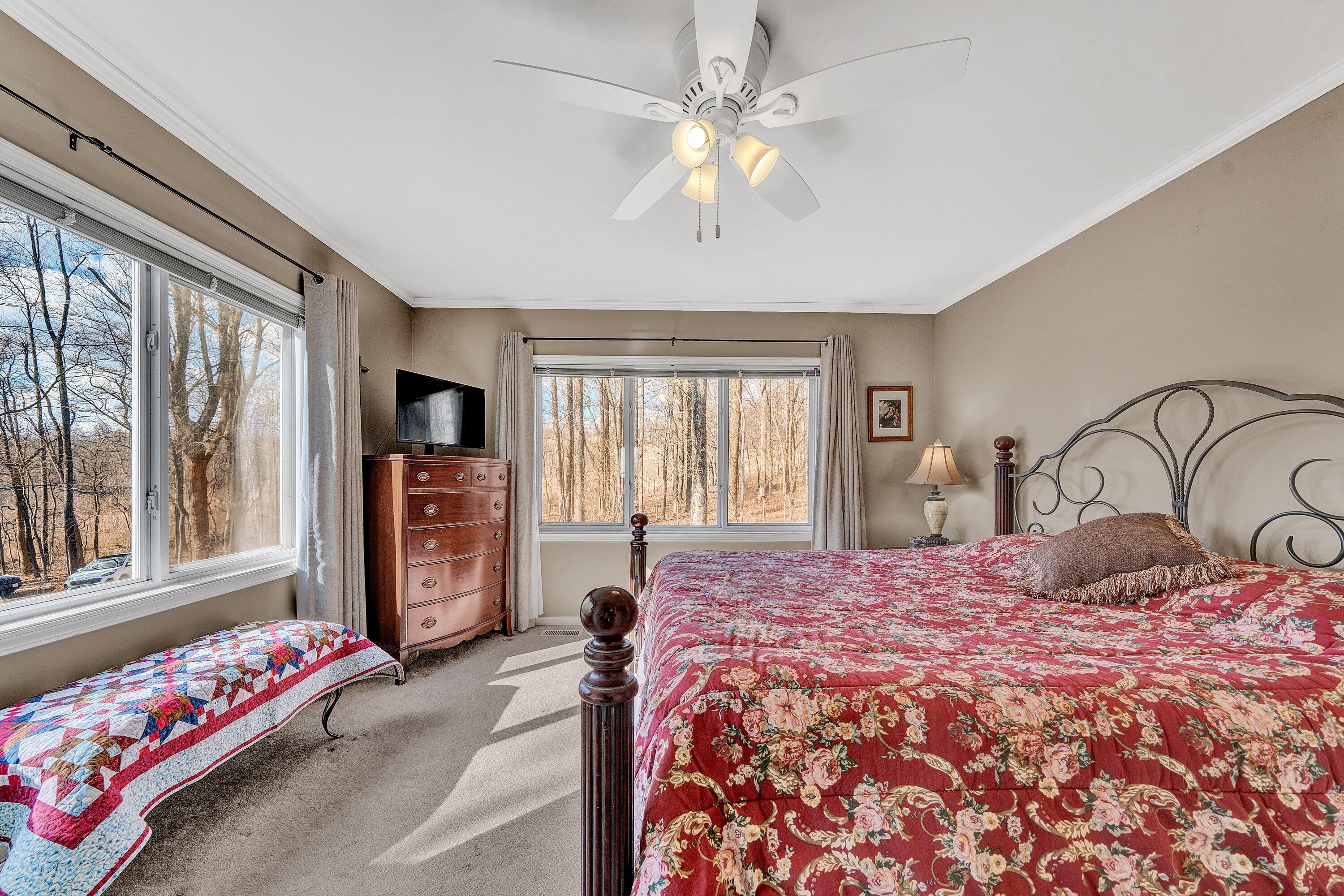 1575 Walnut Knob Road Floyd, VA 24091 - Photo 36 of 62 a bedroom with a bed and a large window with the outer view