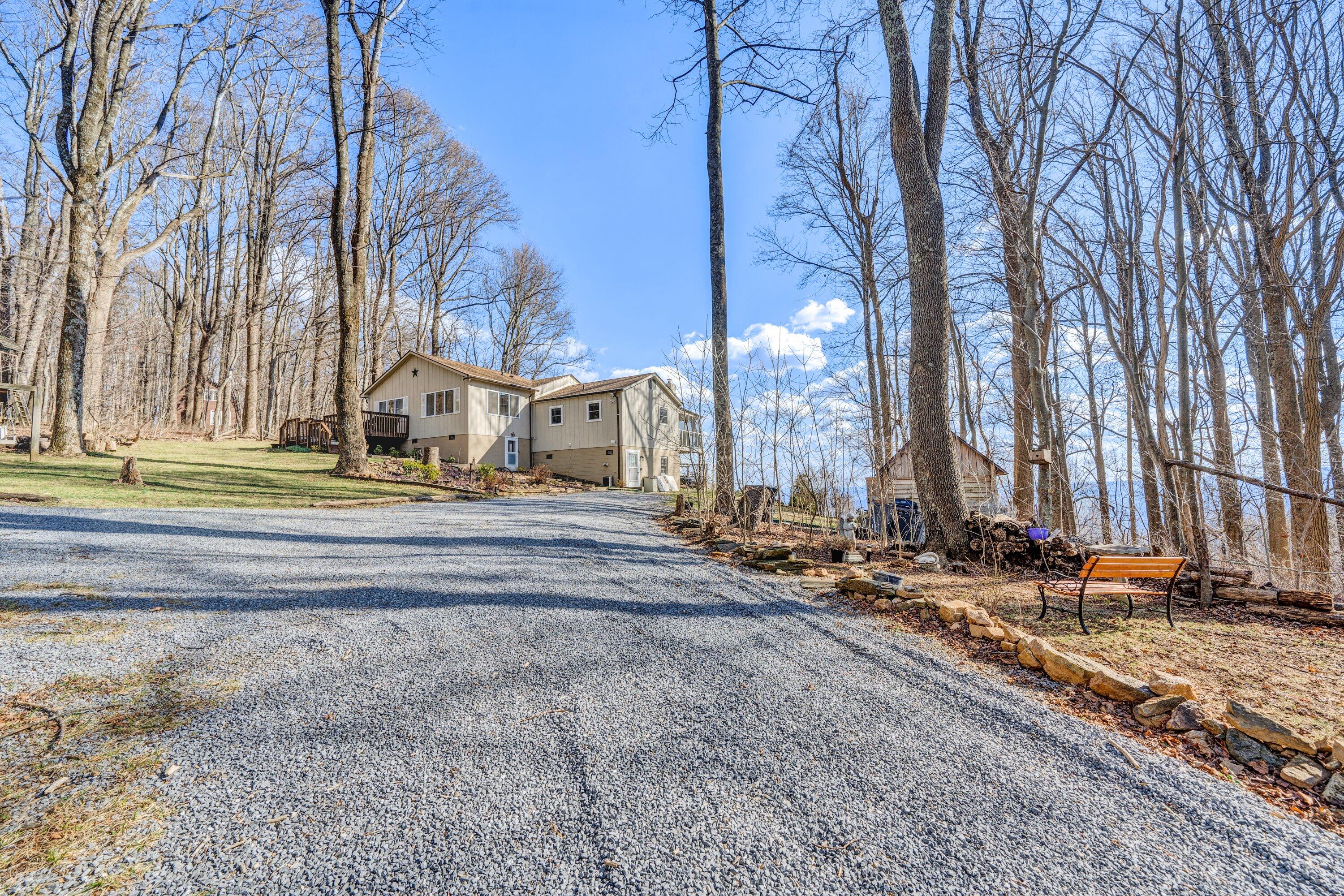 1575 Walnut Knob Road Floyd, VA 24091 - Photo 5 of 62 a pathway of a house with a yard and wooden fence
