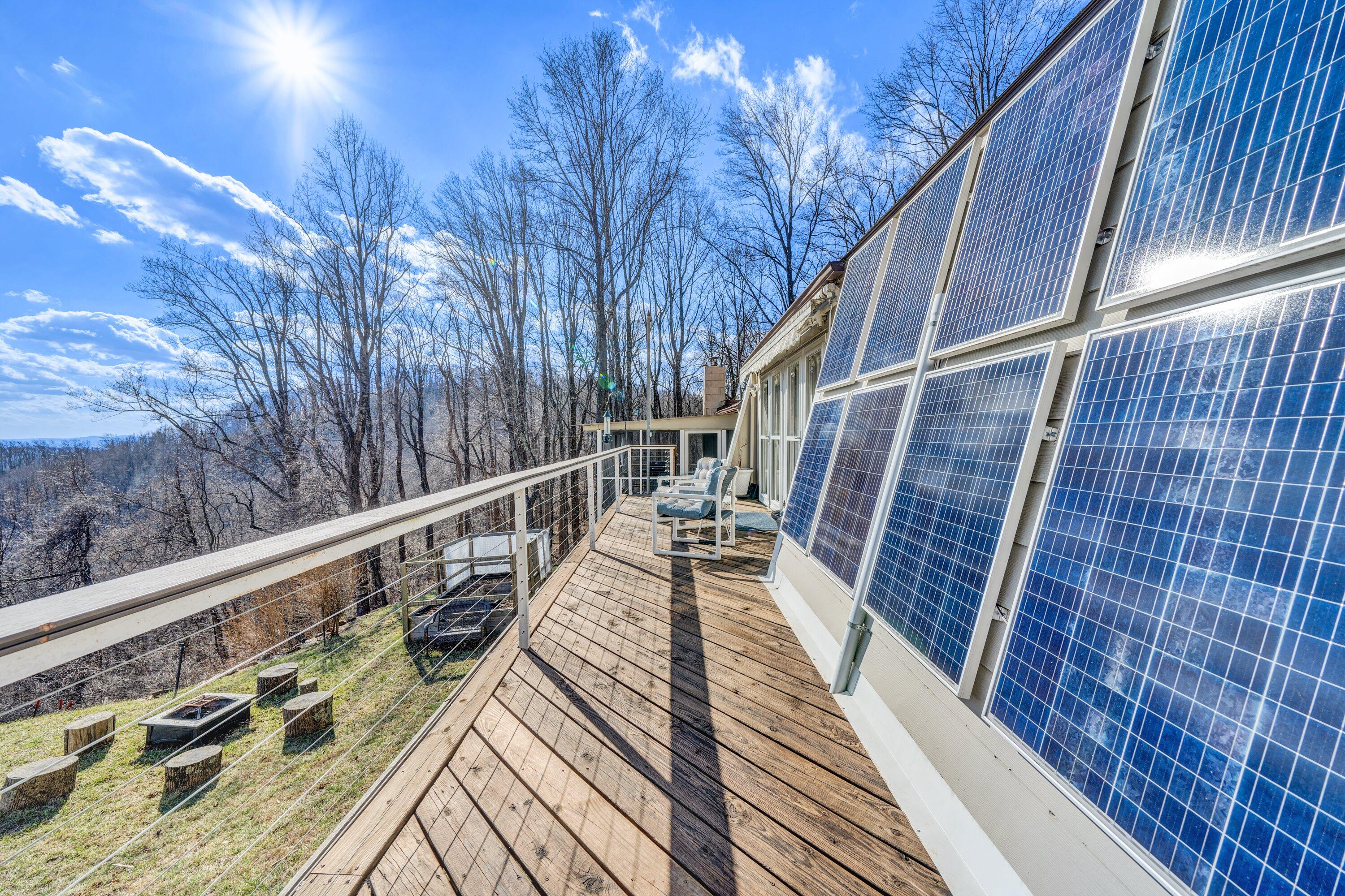 1575 Walnut Knob Road Floyd, VA 24091 - Photo 9 of 62 a view of balcony with wooden floor and fence