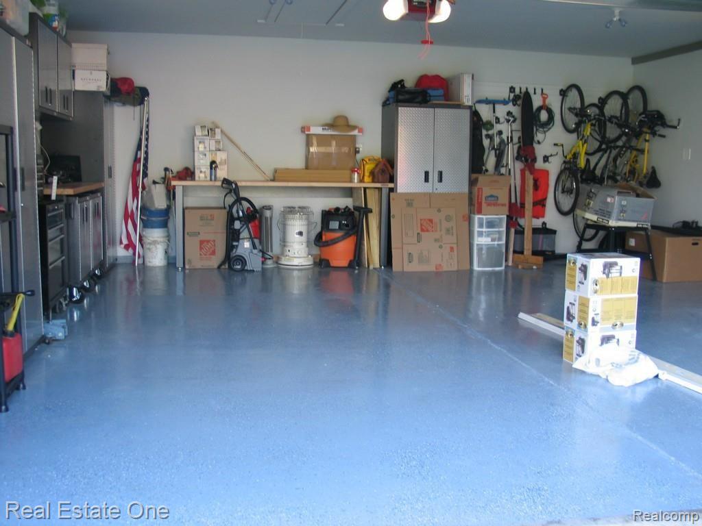 820 Brighton Lake Road Brighton, MI 48116 - Photo 38 of 42 Garage with Epoxy floor