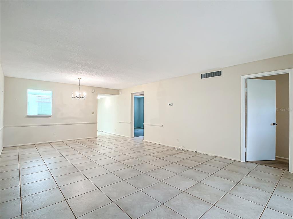 11485 Oakhurst Road, Unit 107 Largo, FL 33774 - Photo 22 of 60 a view of an empty room and window