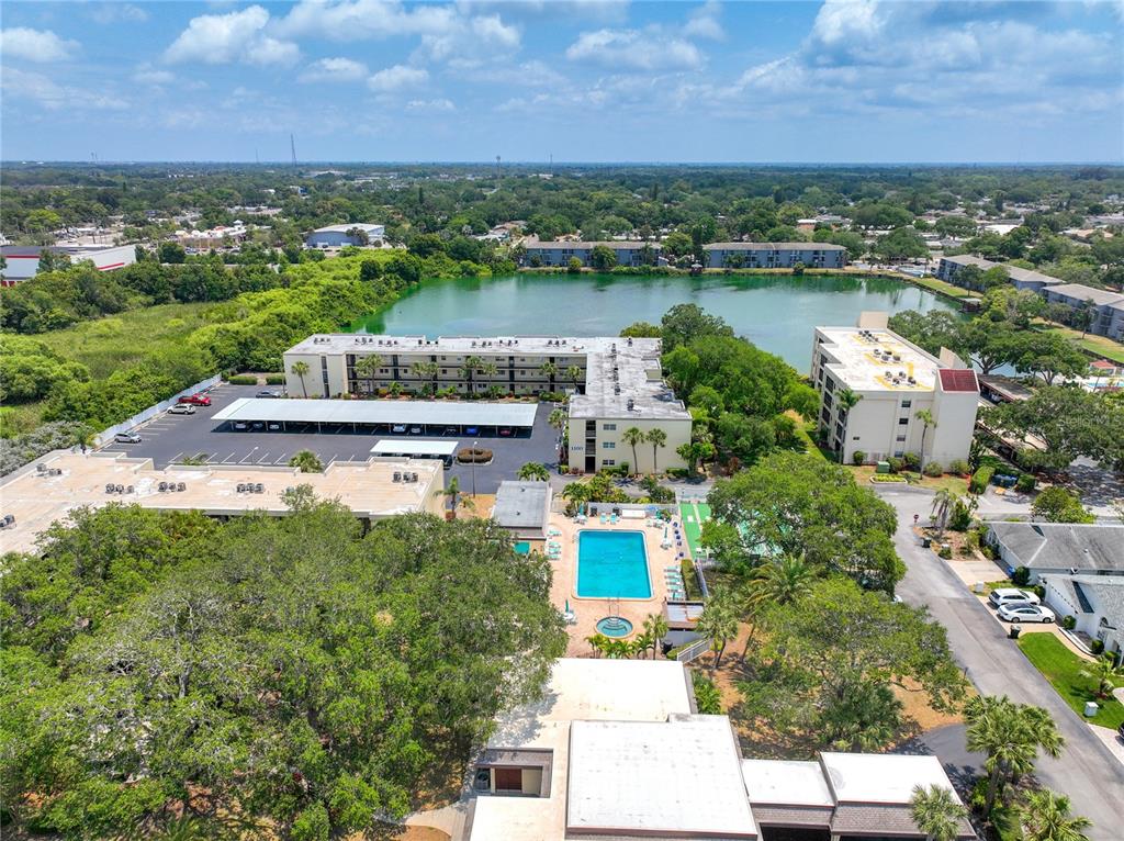 11485 Oakhurst Road, Unit 107 Largo, FL 33774 - Photo 46 of 60 an aerial view of a house with a lake view