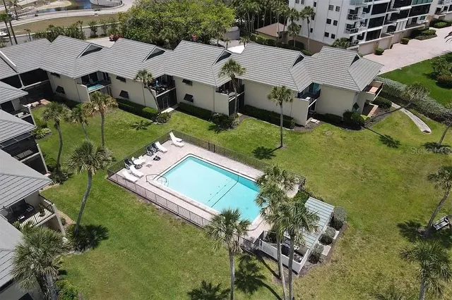 a view of outdoor space with palm trees