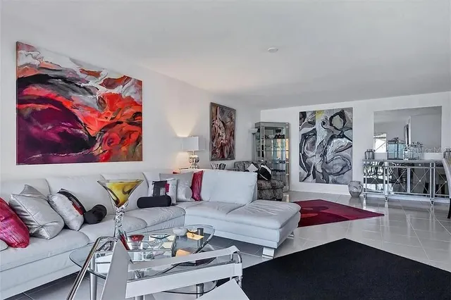 a view of a livingroom with furniture and a fireplace