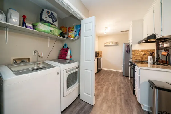 a utility room with dryer and washer